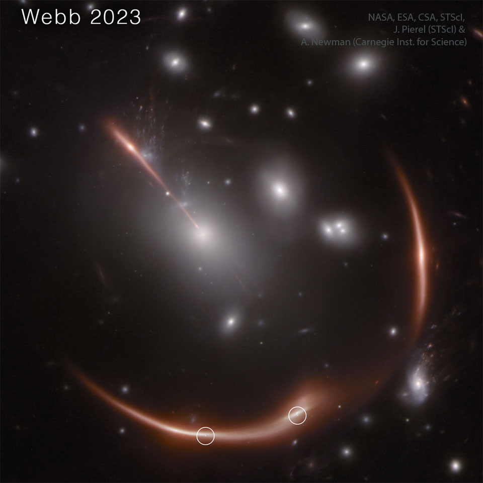 An image shows a cluster of galaxies with unusual arcs.
The arcs are background galaxies distorted by the gravitational 
lens effect of the foreground cluster. The background galaxy 
shows several spots that are supernovas occurring in the galaxy.
Please see the explanation for more detailed information.