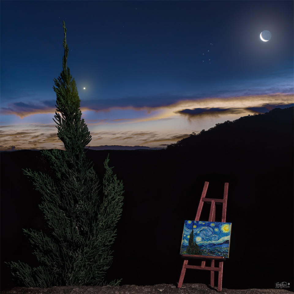 A sunset sky is seen above a dark sloping horizon. A tall
tree is on the left. The sky is partly cloudy with a crescent
Moon on the upper right and a bright planet just to the right
of the tree. Next to the tree in the foreground on the right
is an easel showing the famous van Gogh painting Starry Night.
Please see the explanation for more detailed information.