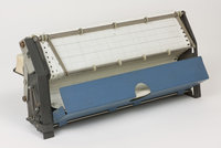 Meccanismo di trasporto della carta estratto dalla sua sede (con cassetto di raccolta della carta alzato)